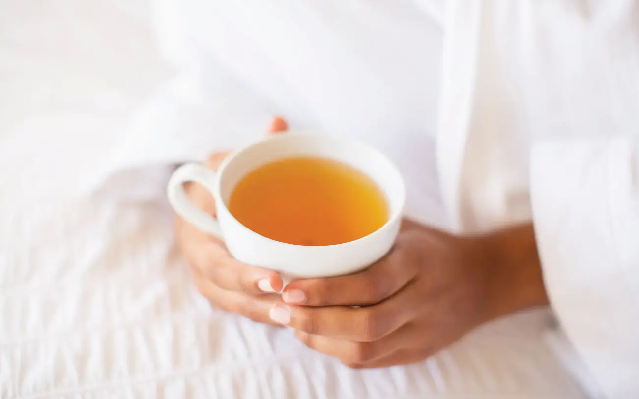 Lady having cup of tea